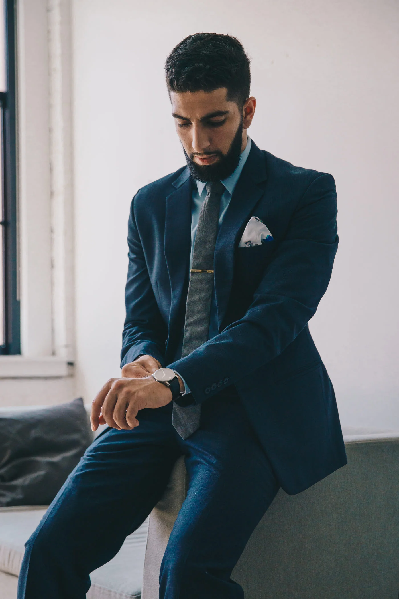 Navy wool trousers worn with the matching jacket